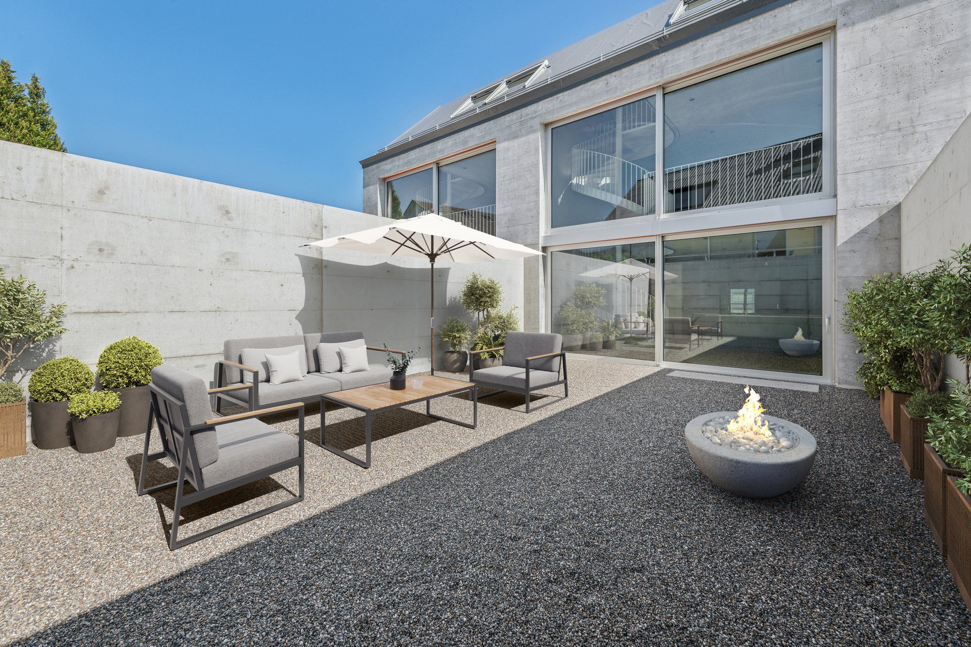 Fertiggestellter Innenhof mit Sommerzimmer und Feuerschale, Townhouse Dorfreben Schleinikon